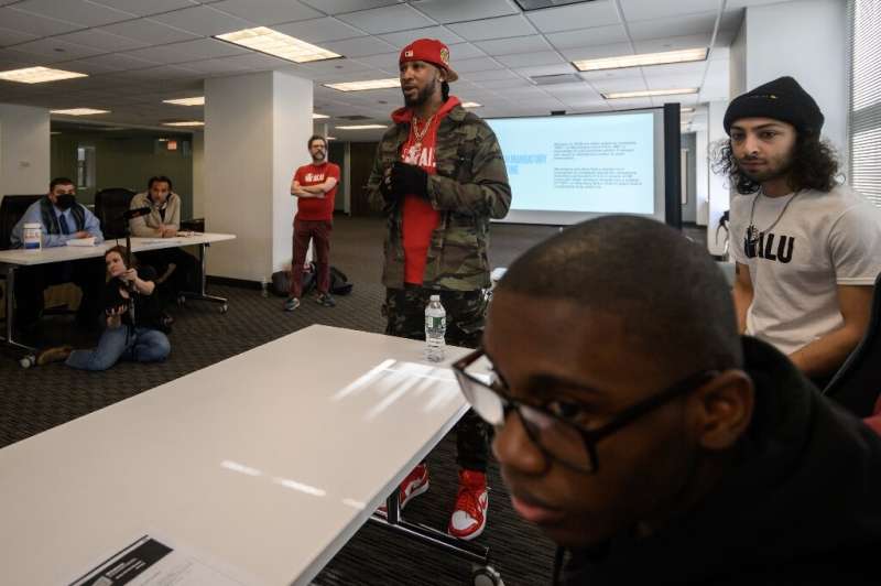 Christian Smalls (C) speaks before attendees at an Amazon Labor Union event in New York city on March 11, 2022