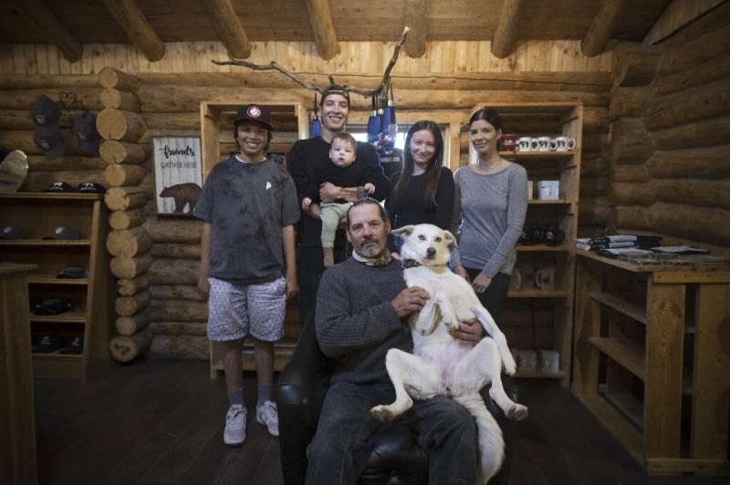 Métis Nation Saskatchewan - Churchill resident Danielle Daley (2nd-R), who is surrounded by her family, recently saw a polar bear run past her house in July