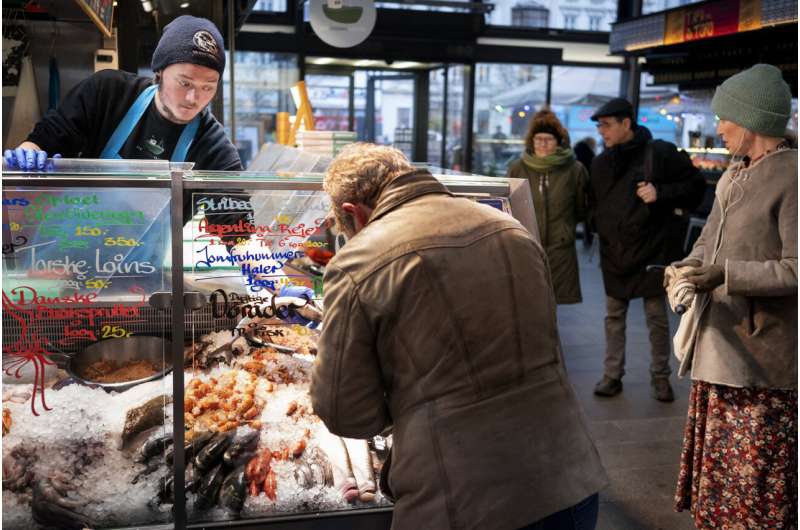 Danes halt virus restrictions; rest of Europe a patchwork