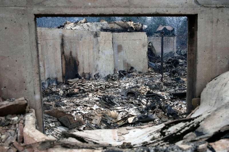 Debris lies scattered in the basement of a home destroyed by wildfire in unincorporated Boulder County, Colorado on December, 31