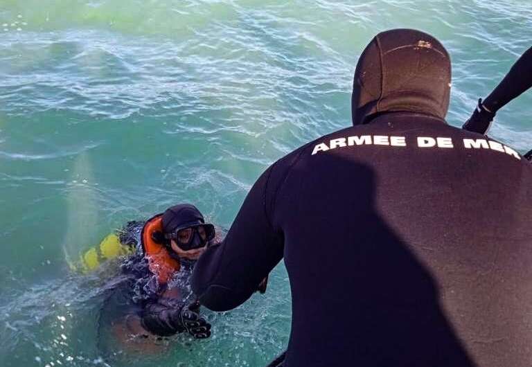 Divers from the Tunisian navy at the scene of the sunken Xelo vessel, off the Gulf of Gabes, in southeastern Tunisia