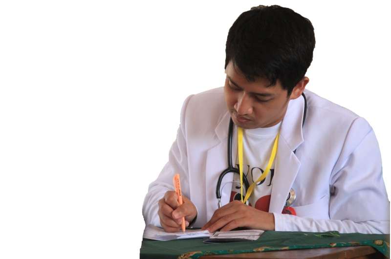 doctor writing
