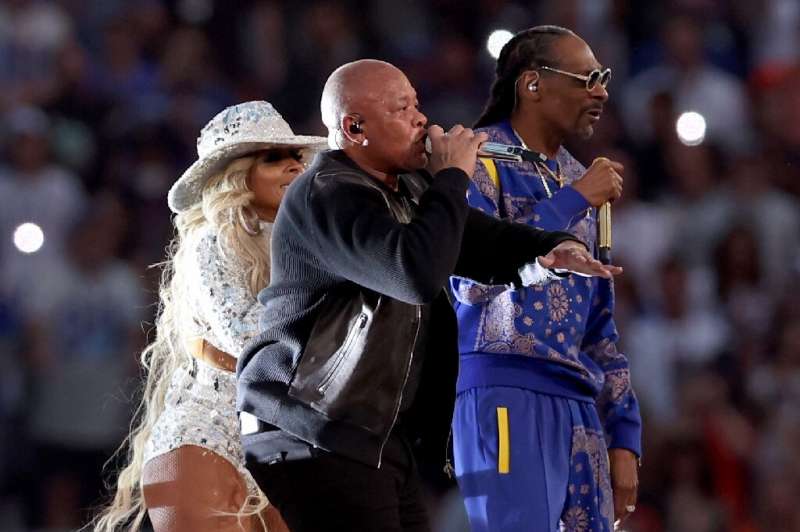 Dr. Dre (centre) performs alongside Mary J. Blige and Snoop Dogg during the 2022 Super Bowl half-time show