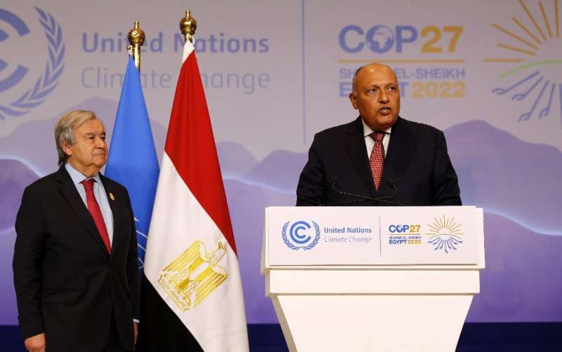 Egypt's Foreign Minister Sameh Shoukry, on the right, speaks as United Nations Secretary General Antonio Guterres stands beside 