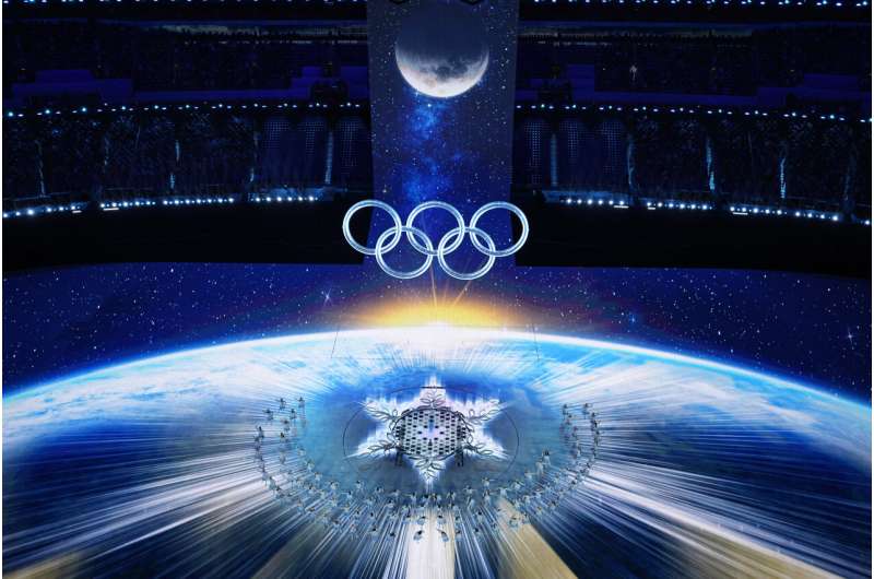 EXPLAINER: Robots and Olympics — a potent photo combination