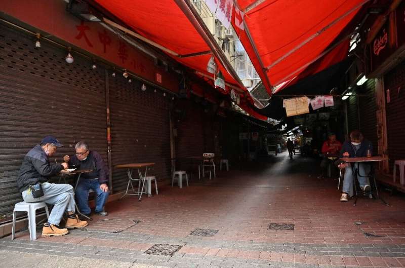 For Hong Kongers, businesses like bars and gyms remain closed, and restaurants are only allowed to serve takeout in the evening