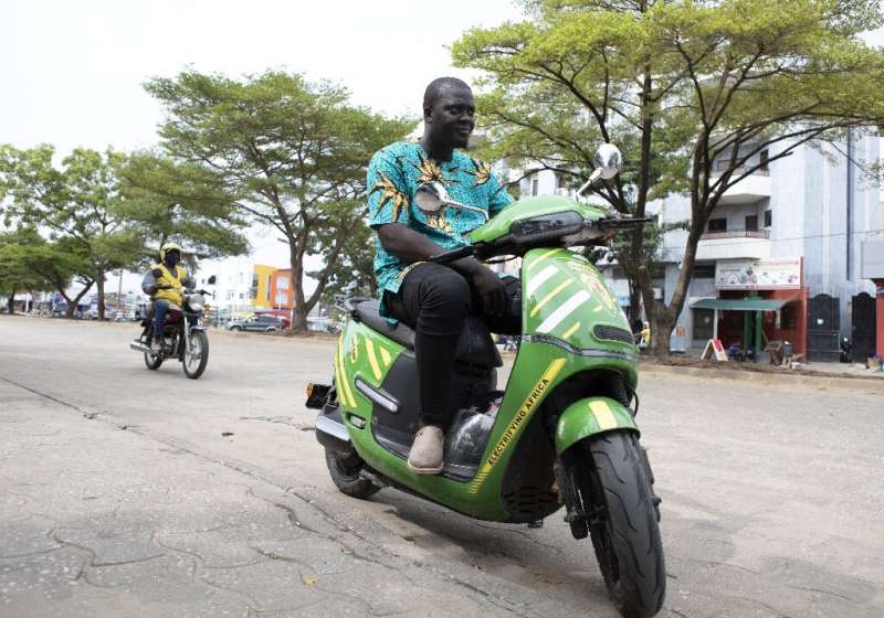 For many drivers in Cotonou, electric motorcycles are more a question of cost than pollution