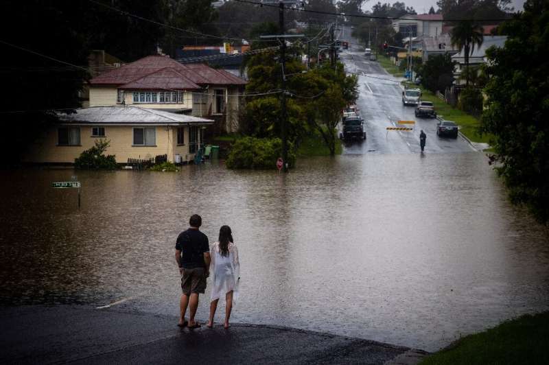 Four people have been killed in floods in eastern Australia as the state of Queensland sees some of the heaviest rains in decade