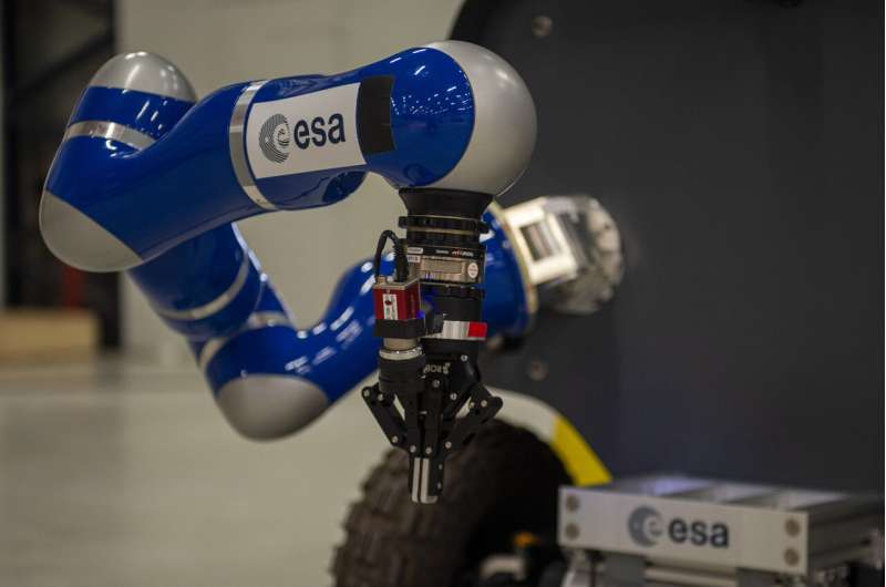 Ground-based rover's touch shared with astronaut in space