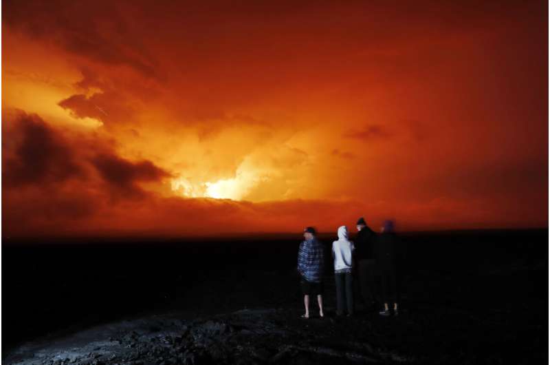 Hawaii volcano eruption has some on alert, draws onlookers