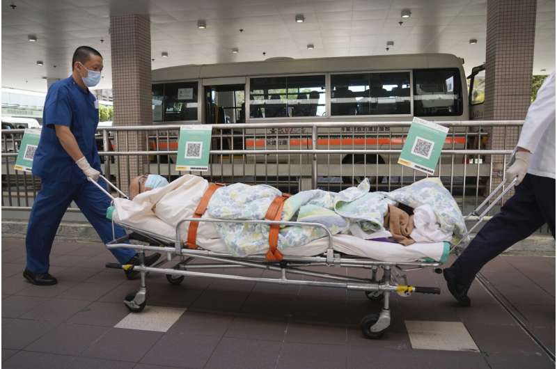 Hong Kong puts mass testing on hold as COVID-19 deaths rise