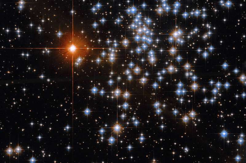 Hubble Spies Sparkling Spray of Stars in NGC 2660