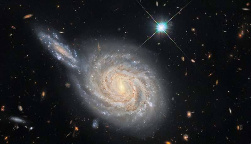 Image: Hubble sees cosmic clues in a galactic duo