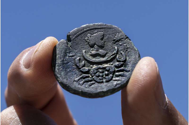 In a first, coin bearing zodiac found off Israel's coast