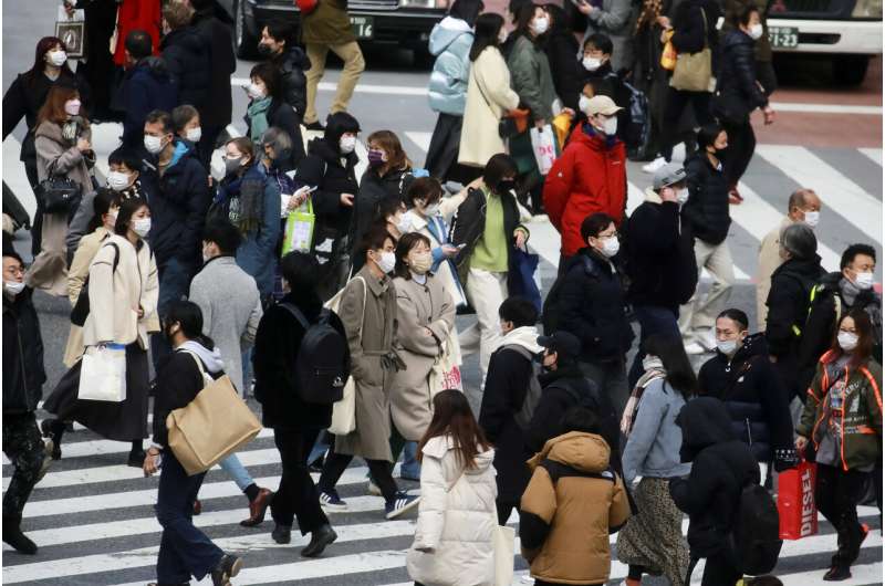 Japan widens COVID curbs, including in Tokyo, as cases surge