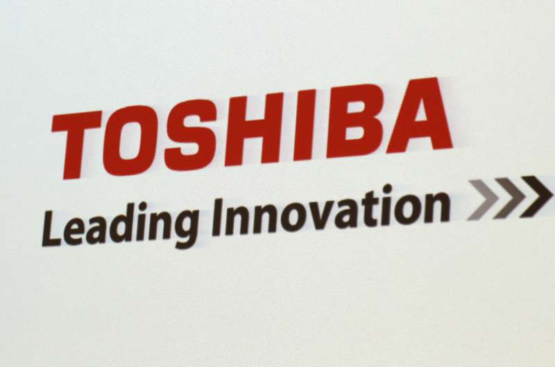 Japan's tech giant Toshiba to split; sell stake in Carrier