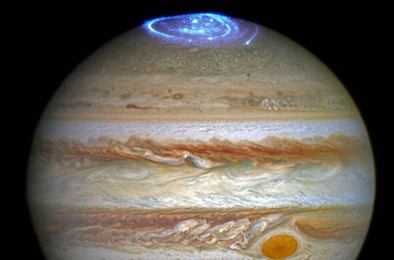 Juno and Hubble data reveal electromagnetic 'tug-of-war' lights up Jupiter's upper atmosphere