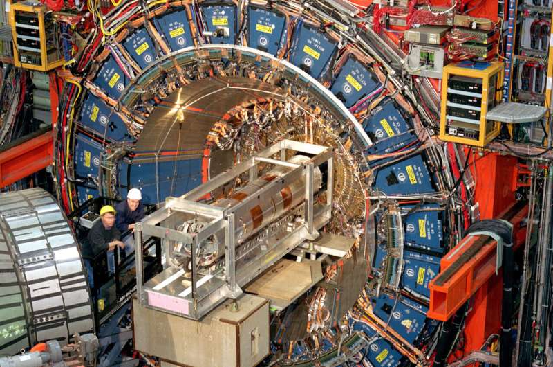 Key particle weighs in a bit heavy, confounding physicists