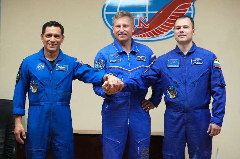 NASA astronaut Frank Rubio (L), and Russian cosmonauts Sergey Prokopyev and Dmitri Petelin, are set to blast off to the Internat