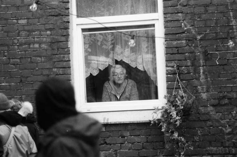old person at window