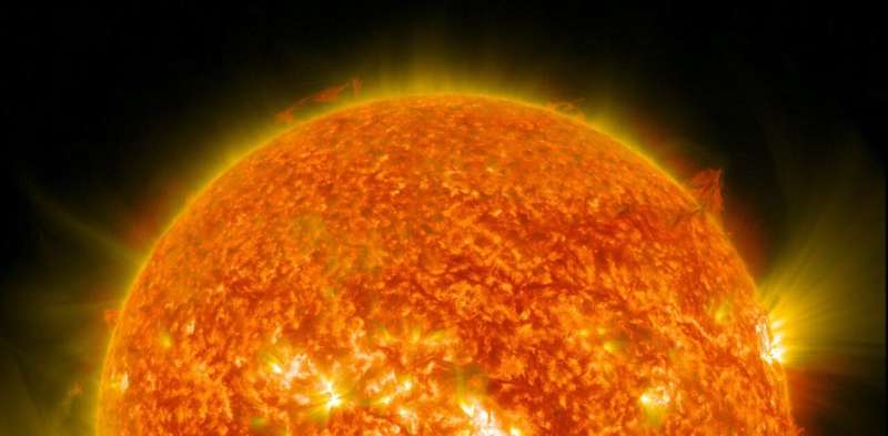 'One of Physics' Greatest Damned Mysteries': Studying the Distant Sun in the Most Accurate Astronomical Test of Electron