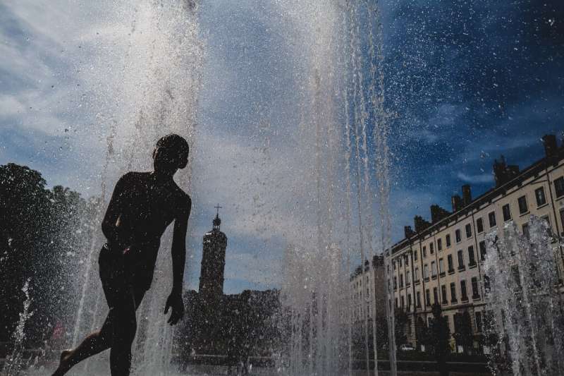 People across France were looking for ways to cool off in unseasonable heat
