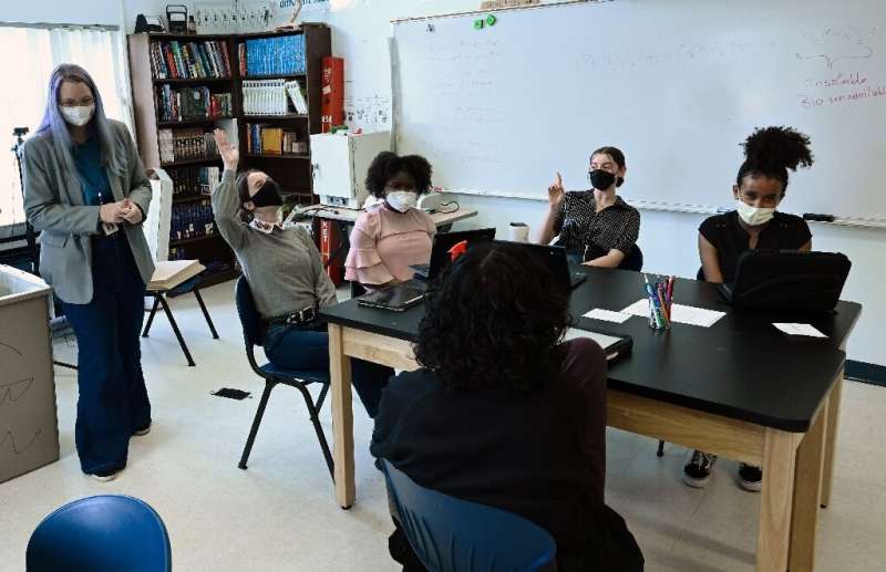Rebecca Bushway with students in her high school science class at Barrie Middle and Upper School, in Silver Spring, Maryland