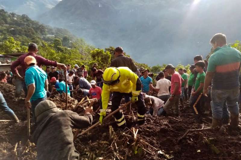 Rescuers search for survivors  after a mudslide in the village of Alta Verapaz  in Guatemala in May 2022