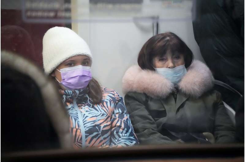 Russia sets another daily virus record amid omicron surge