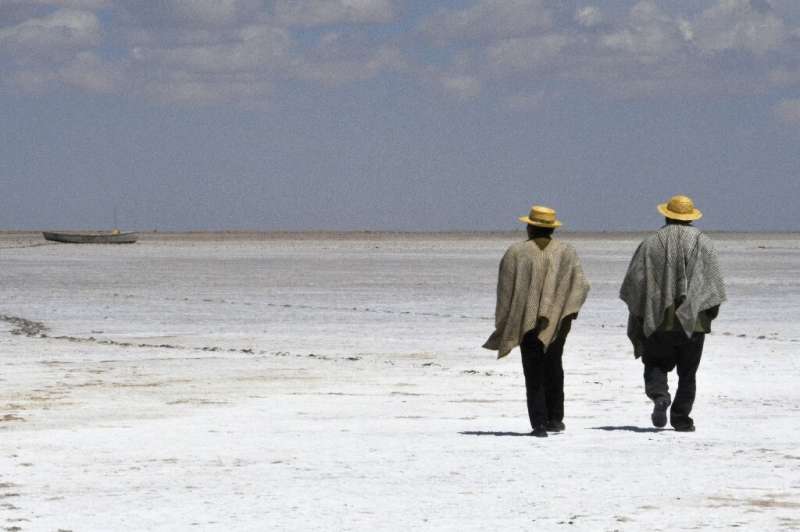 Scientists have blamed a confluence of factors including climate change and water extraction for Bolivia's Lake Poopo's lake dry