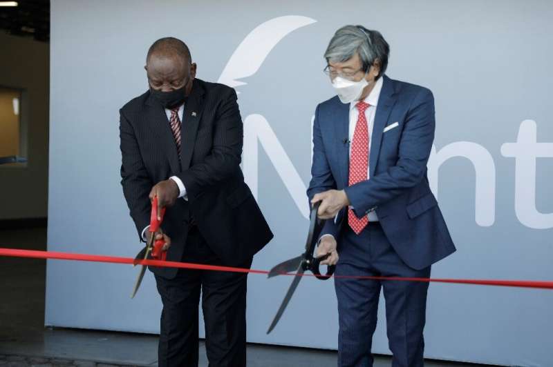 Scissor ceremony: President Cyril Ramaphosa, left, joins biotech tycoon Patrick Soon-Shiong in launching the vaccine hub