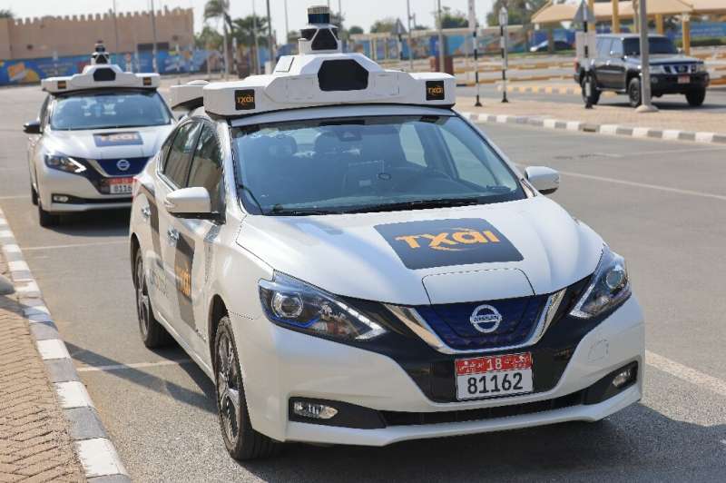 Des taxis autonomes utilisés lors d'une démonstration dans la capitale des Émirats arabes unis, Abu Dhabi, vus sur cette photo de décembre 2021