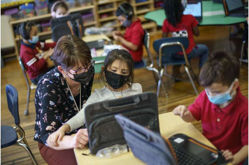 Some schools hit hard by virus make few changes for new year