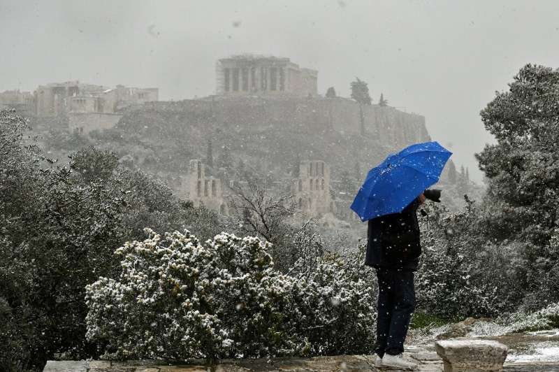Temperatures plunged to -14 degrees Celsius (6.8 degrees Fahrenheit) in Athens, where schools and vaccination centres closed