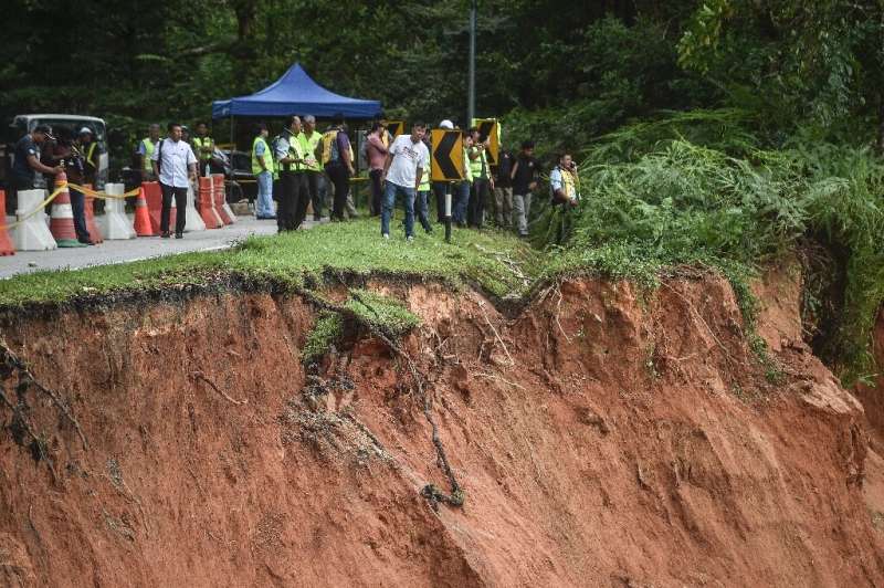 Ten people were still missing after the predawn landslide hit a campsite just outside the capital Kuala Lumpur