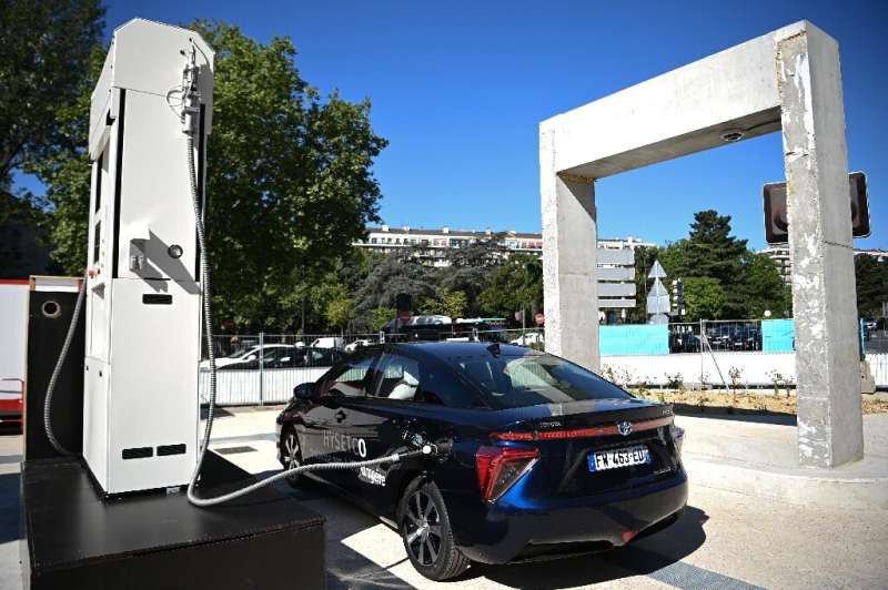 The future? A car powered by hydrogen fuelcells gets a top-up at a filling station in Paris. The facility was presented to the m