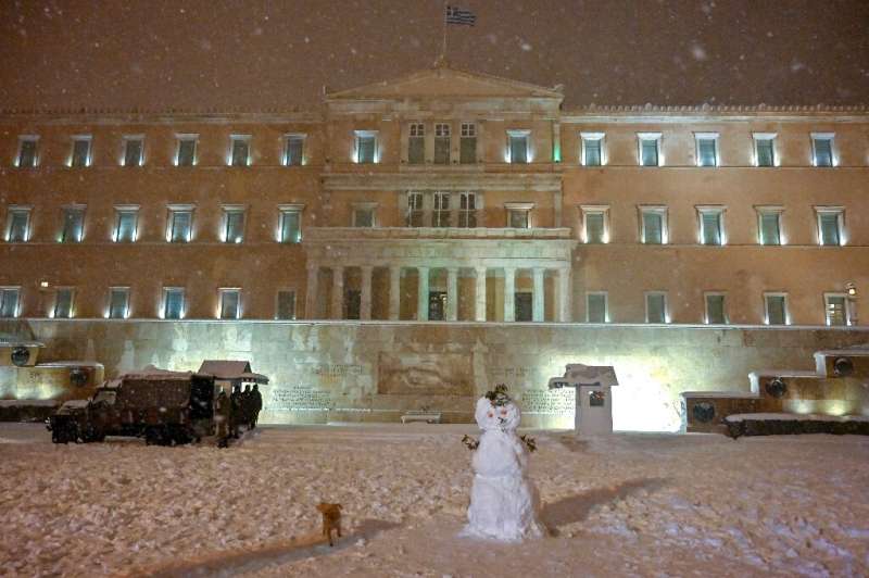 The Greek parliament in Athens suspended its session  because of the unusually heavy snow