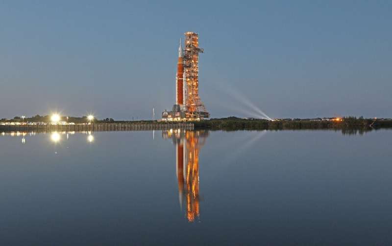 The large Artemis I stone is illuminated at night on a telephone launch pad leading to Launch Pad 39B from Vehicle As.