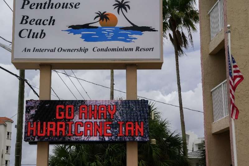The message &quot;Go Away Hurricane Ian&quot; is displayed outside a condominium complex in St. Pete Beach near the city of St. 