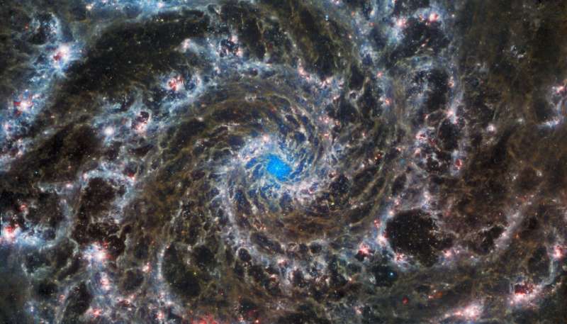The Phantom Galaxy is a &quot;favorite target for astronomers studying the origin and structure of galactic spirals,&quot; NASA 