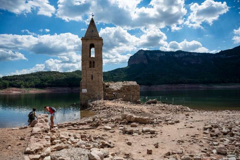 The receding waters have exposed the ruins of an 11th-century church in the usually submerged village of Sant Roma de Sau