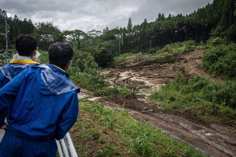 The storm triggered landslides and toppled trees as it passed over Japan