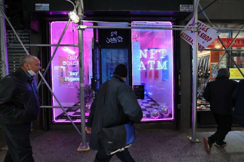 The world's first NFT vending machine, which opened in New York last month. The customer chooses an NFT and buys it with a credi