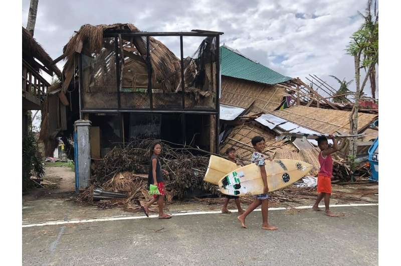 The wreckage of a home in General Luna town, Siargao island, in the Philippines in December 2021 following Typhoon Rai, one of a