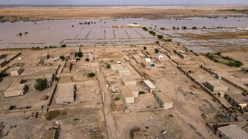 This file photo taken on August 19, 2022, shows an aerial view of the aftermath of floods in the village of Makaylab in Sudan's 