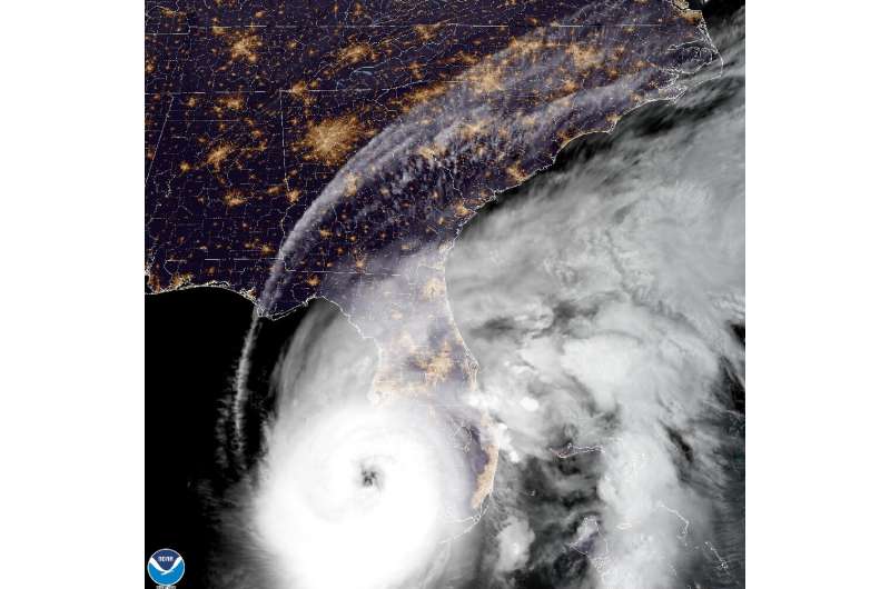 This National Oceanic and Atmospheric Administration (NOAA) satellite handout image shows Hurricane Ian approaching Florida as a