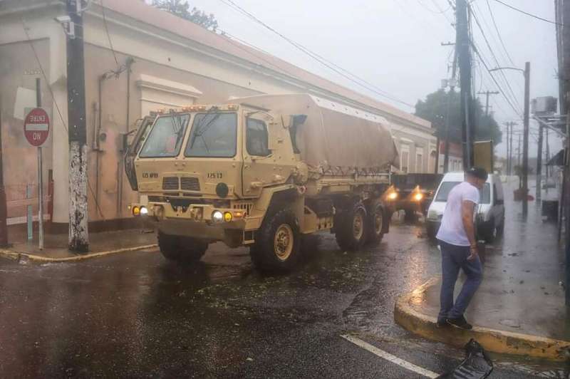 This undated handout photo shows members of the National Guard providing hurricane assistance in Puerto Rico