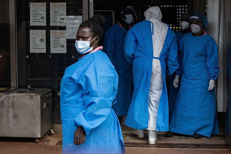Ugandan medical staff treating Ebola patients at Mubende Regional Referral Hospital last month.