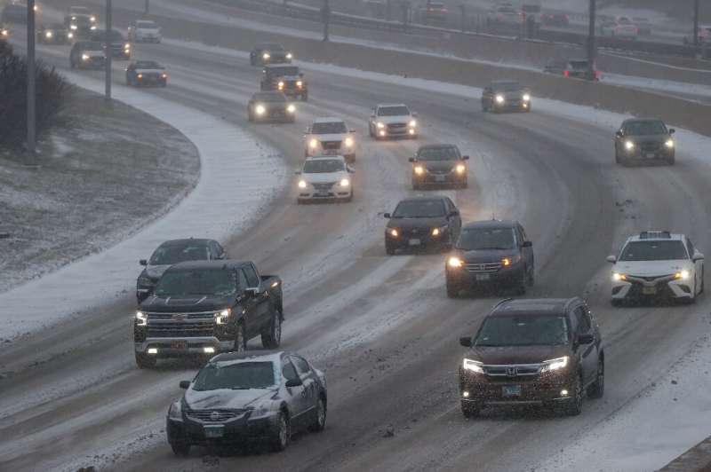 Vehicles move at the 1-90 Kennedy Expressway in Chicago ahead of the Christmas holiday season