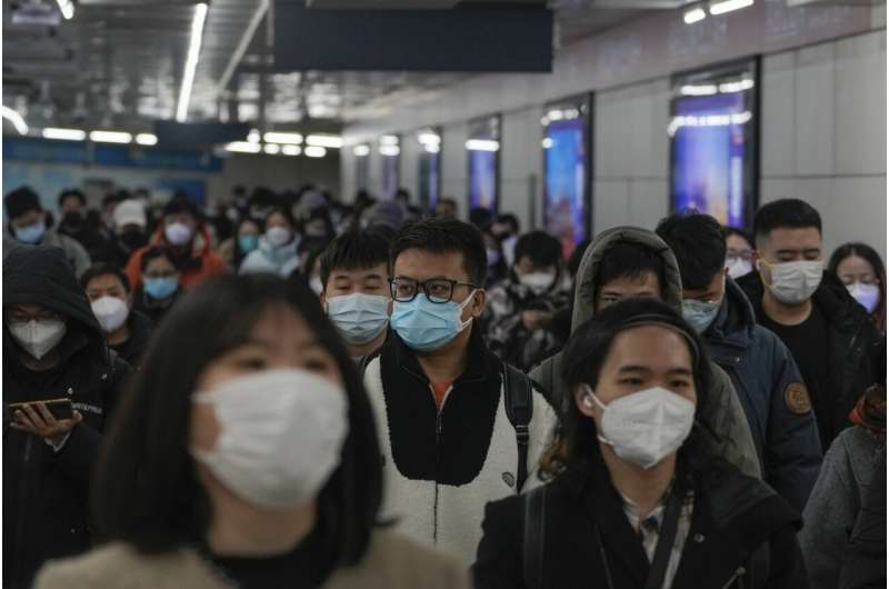 Virus death toll in China's capital shows further rise